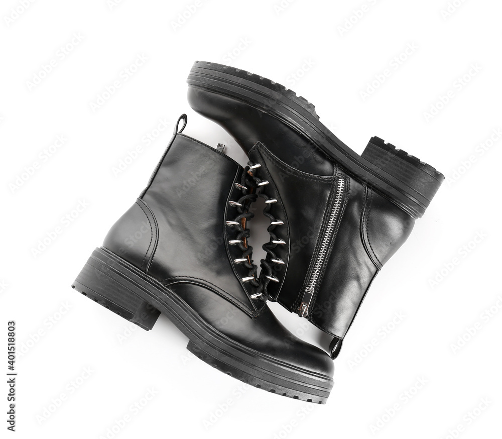 Leather female boots on white background