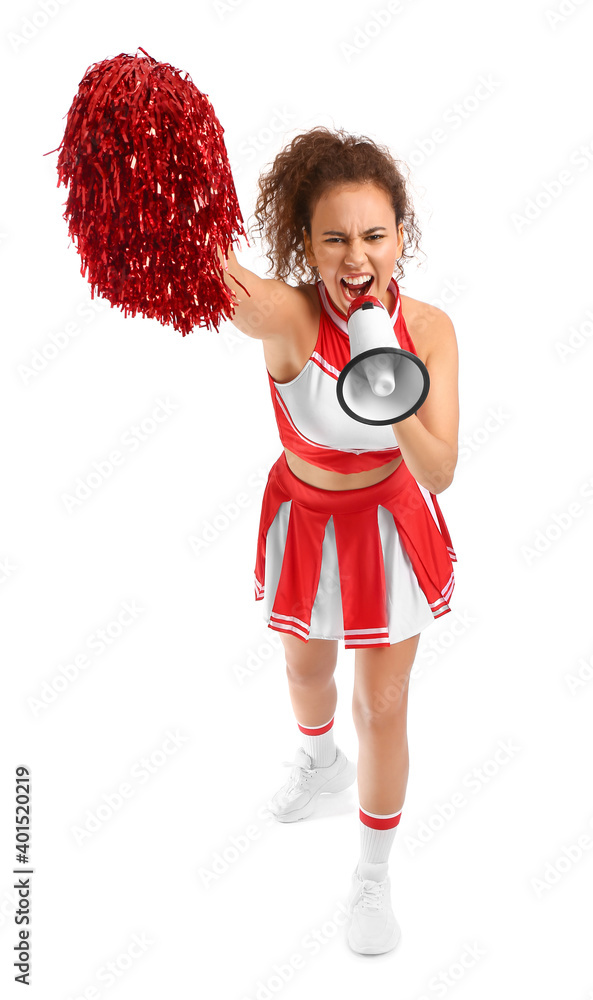 Beautiful young cheerleader with megaphone on white background