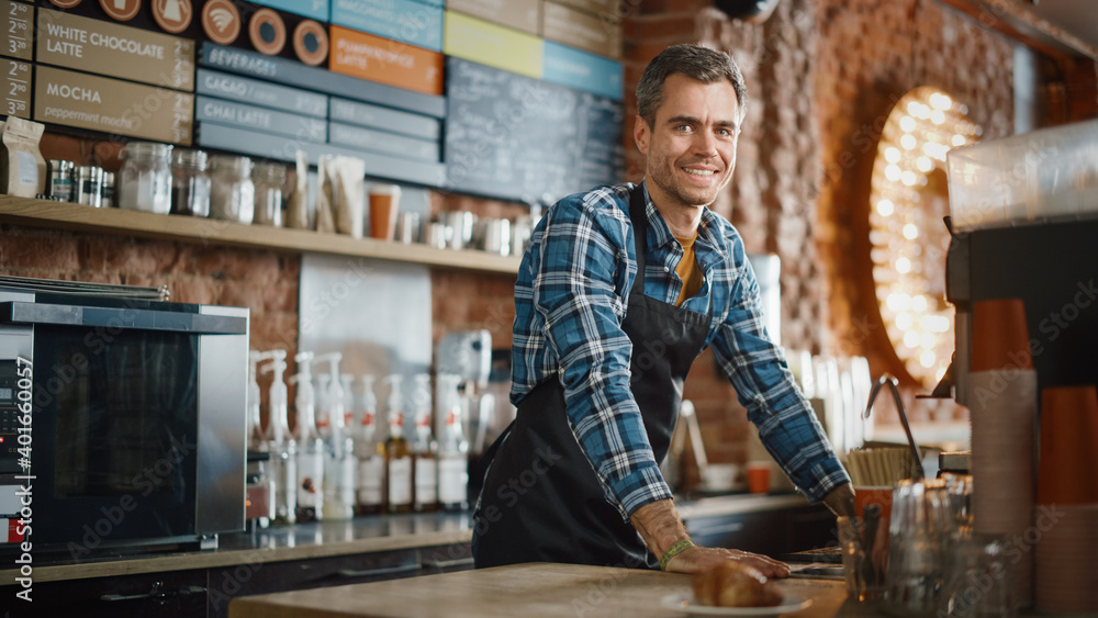 Handsome Barista in Checkered Shirt and Black Apron is Making a Cup of Cappuccino in Coffee Shop Bar