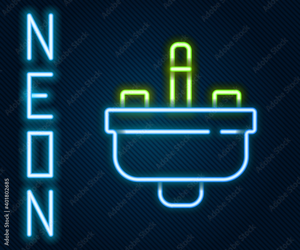 Glowing neon line Washbasin with water tap icon isolated on black background. Colorful outline conce