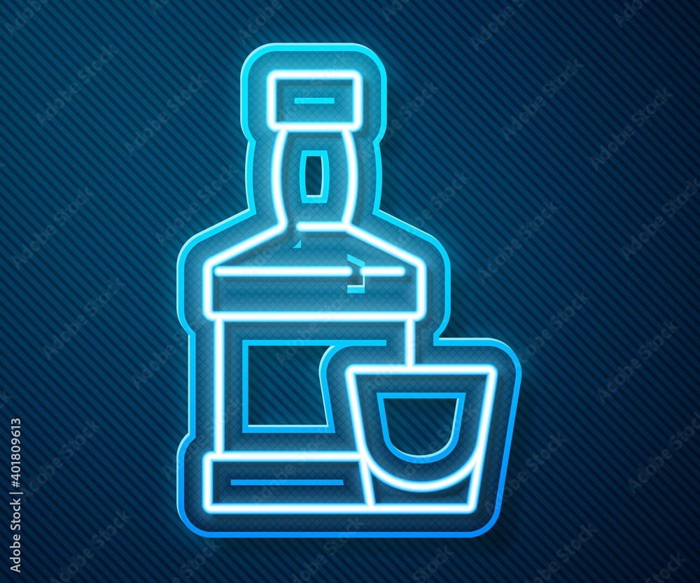 Glowing neon line Whiskey bottle and glass icon isolated on blue background. Vector.