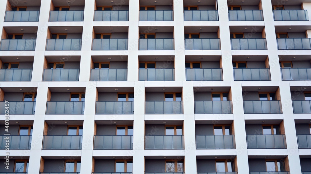 Facade of new apartment building. Glass balcony and clean look of modern architecture building with 