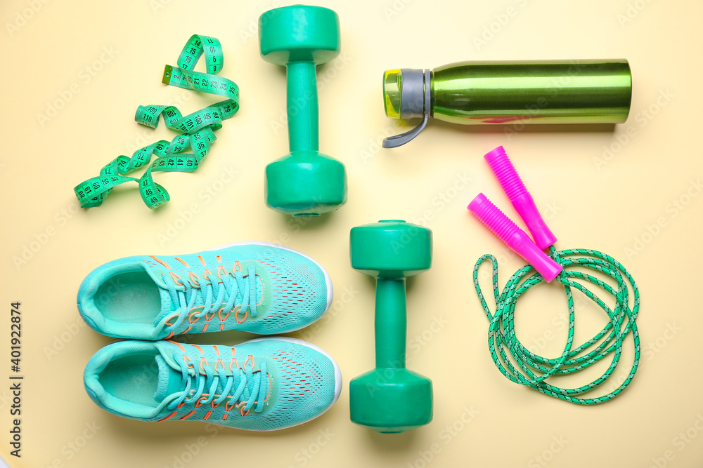 Set of sport equipment on light background