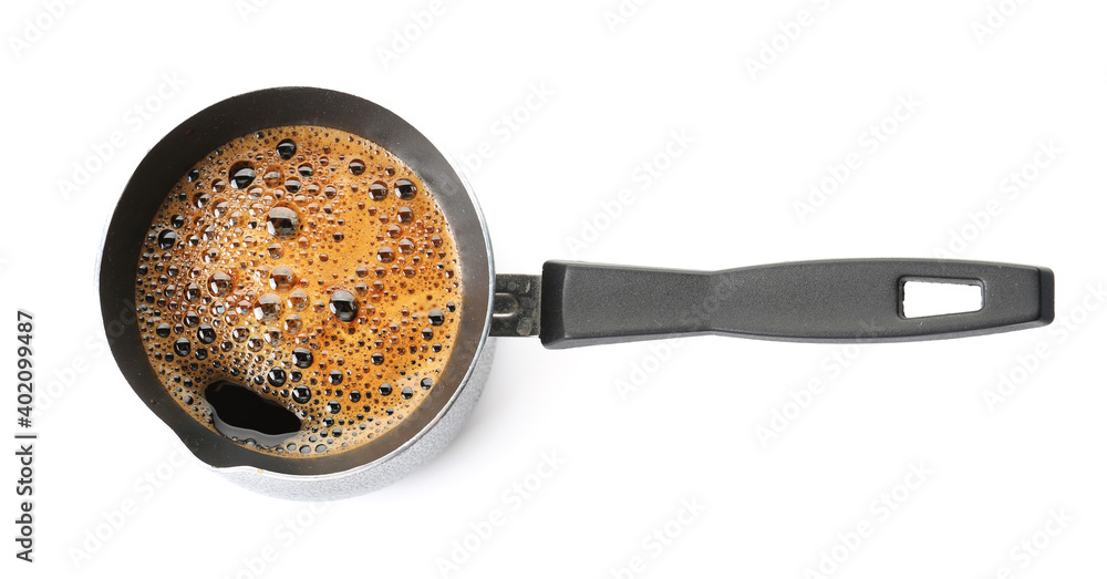 Cezve with coffee on white background