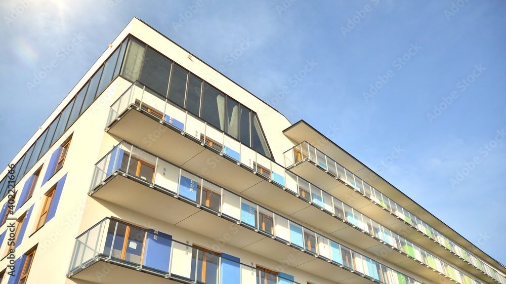 Apartment residential house and home facade architecture and outdoor facilities. Blue sky on the bac