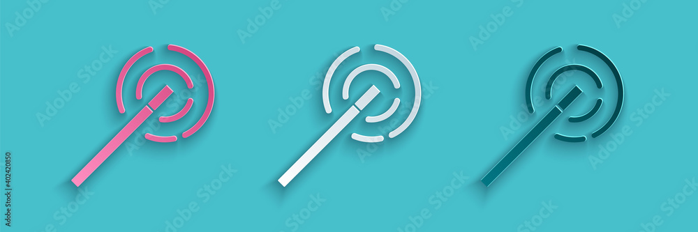 Paper cut Magic wand icon isolated on blue background. Star shape magic accessory. Magical power. Pa