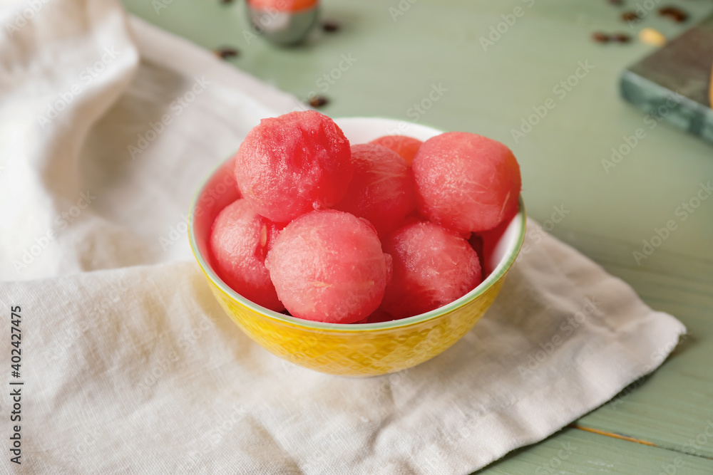 Tasty watermelon balls in bowl on table