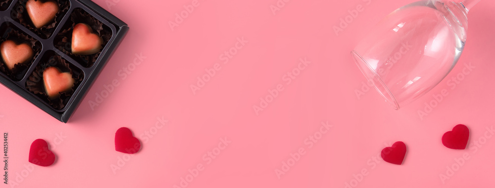 Valentines Day dating gift with wine and rose concept on pink background