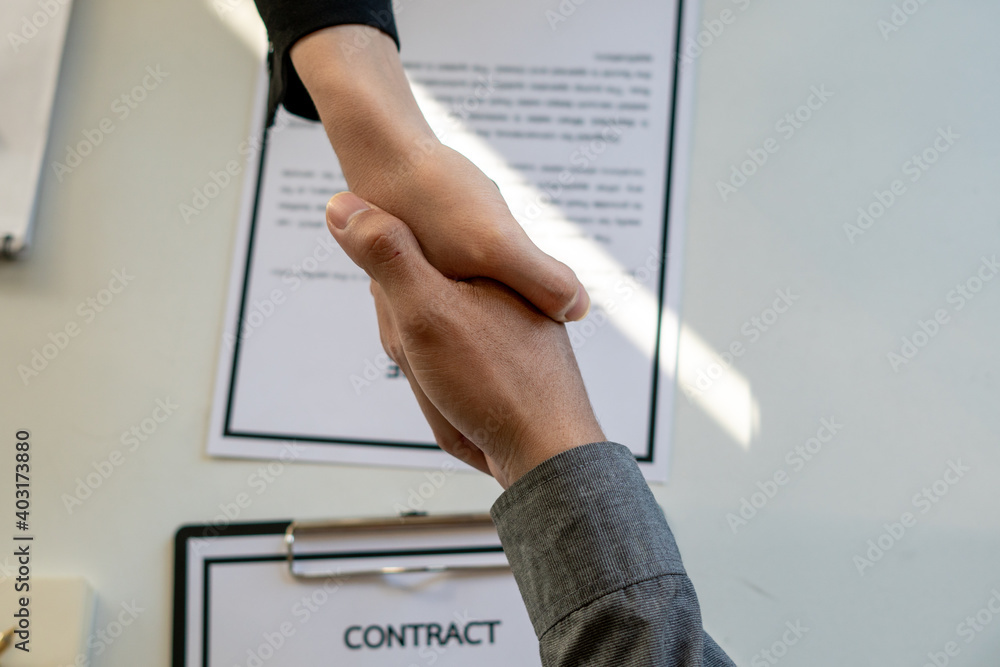 business partnership handshake concept.Photo of two businessmen handshaking process.Successful deal 