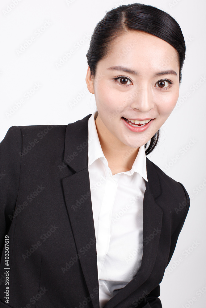 A young business woman in a suit