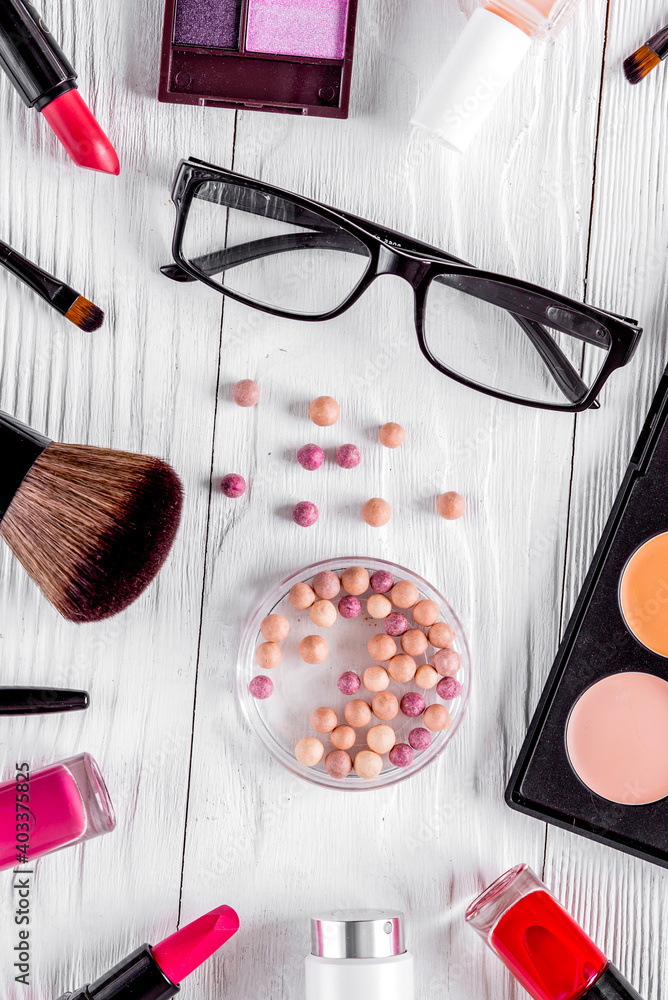 glasses and cosmetics on white woman table background top view