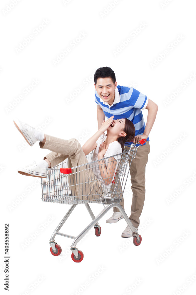 A happy young couple are Grocery shopping 