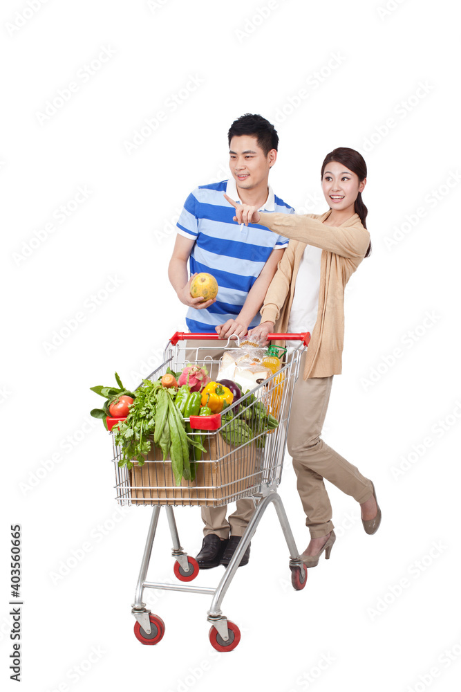 A happy young couple are Grocery shopping 