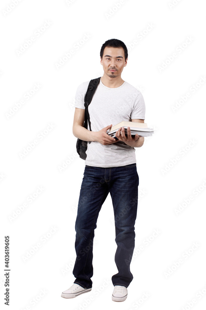 A male college student was holding a book