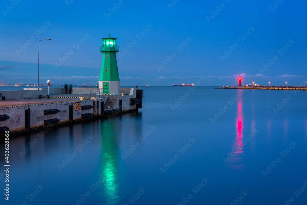 Lighthouse on the west breakwater in Nowy Port at dusk, Gdańsk. Poland