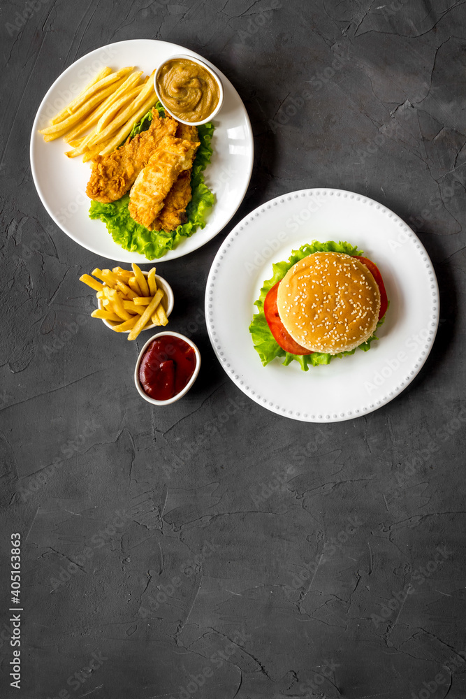 Overhead view of fast food - burger and french fries, flat lay