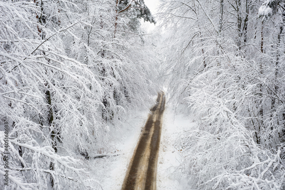 Aerial view of the road in idyllic winter landscape. Poland