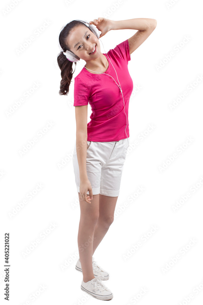 Young woman listening to music with headphones