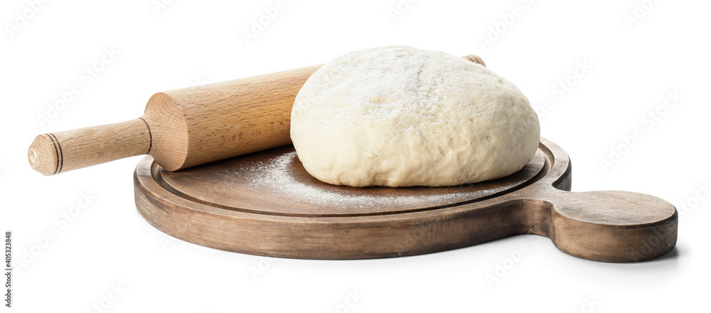 Fresh dough and rolling pin on white background