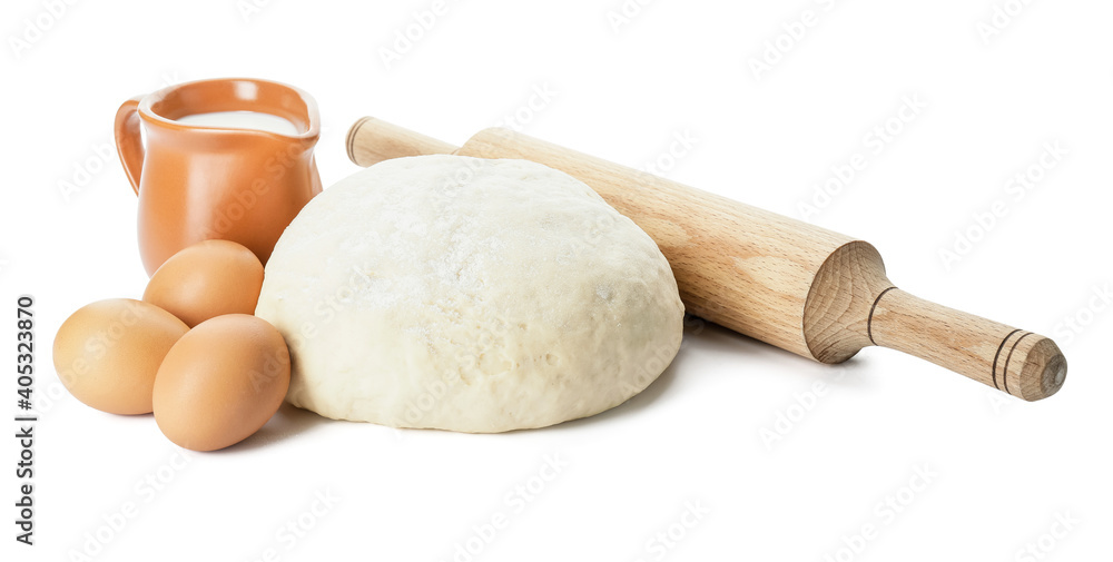 Fresh dough, ingredients and rolling pin on white background