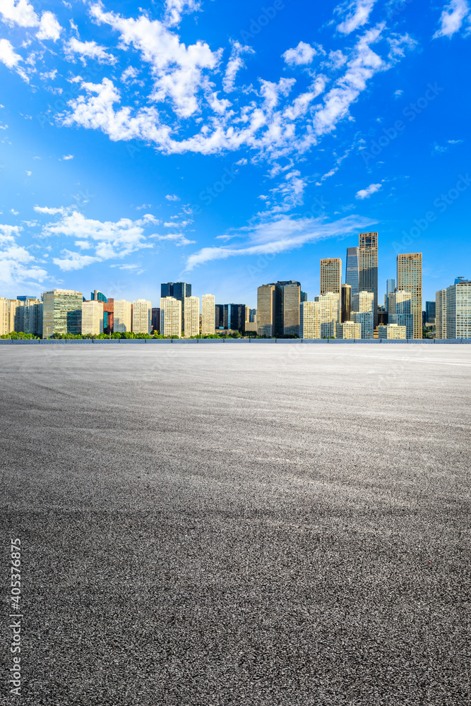 Asphalt road ground and modern city commercial buildings in Beijing,China.