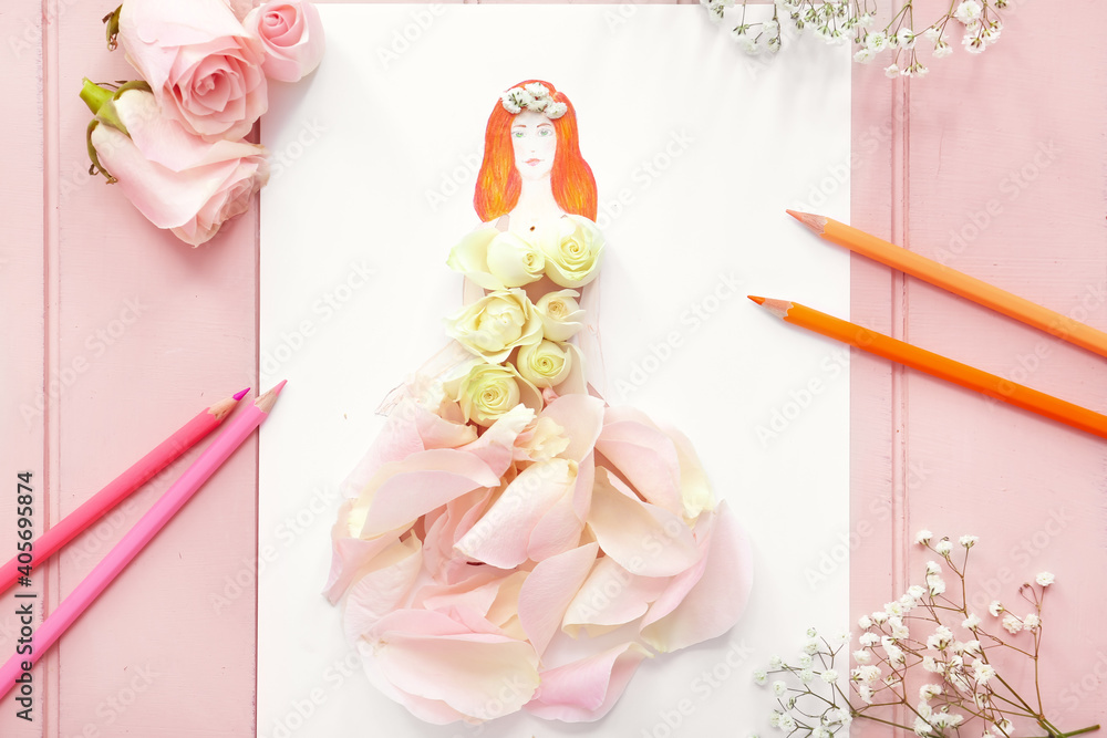 Drawn woman in dress made of rose petals on wooden background