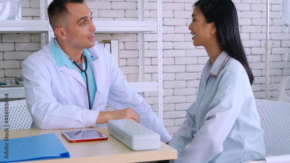 Doctor in professional uniform examining patient at hospital or medical clinic. Health care , medica