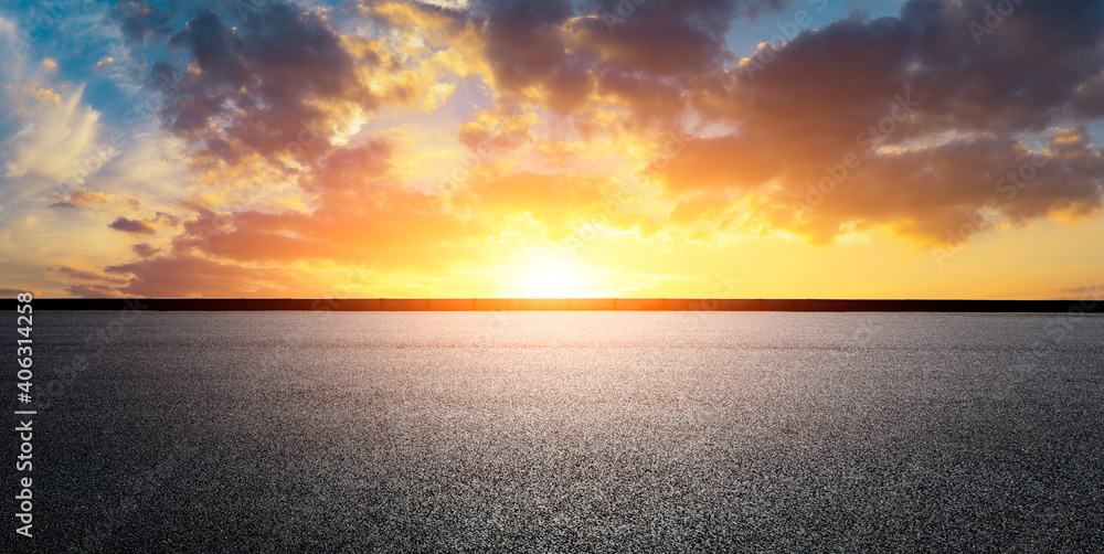 Asphalt road and sky clouds at sunset.Road background.