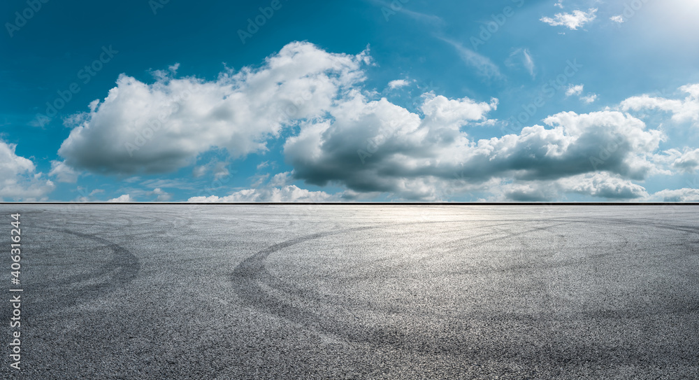 Asphalt race track road and sky clouds.Road ground background.