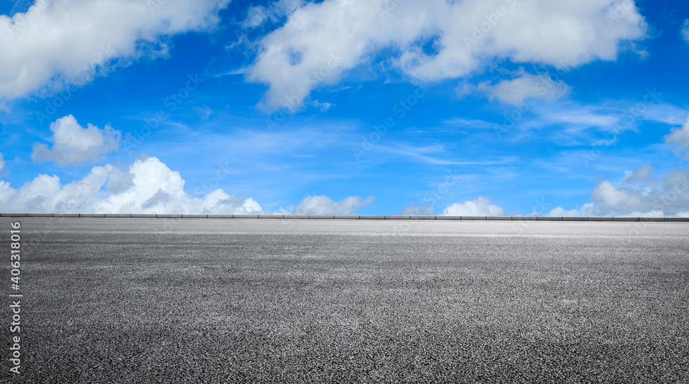 Empty asphalt road and blue sky with white clouds.Road background.