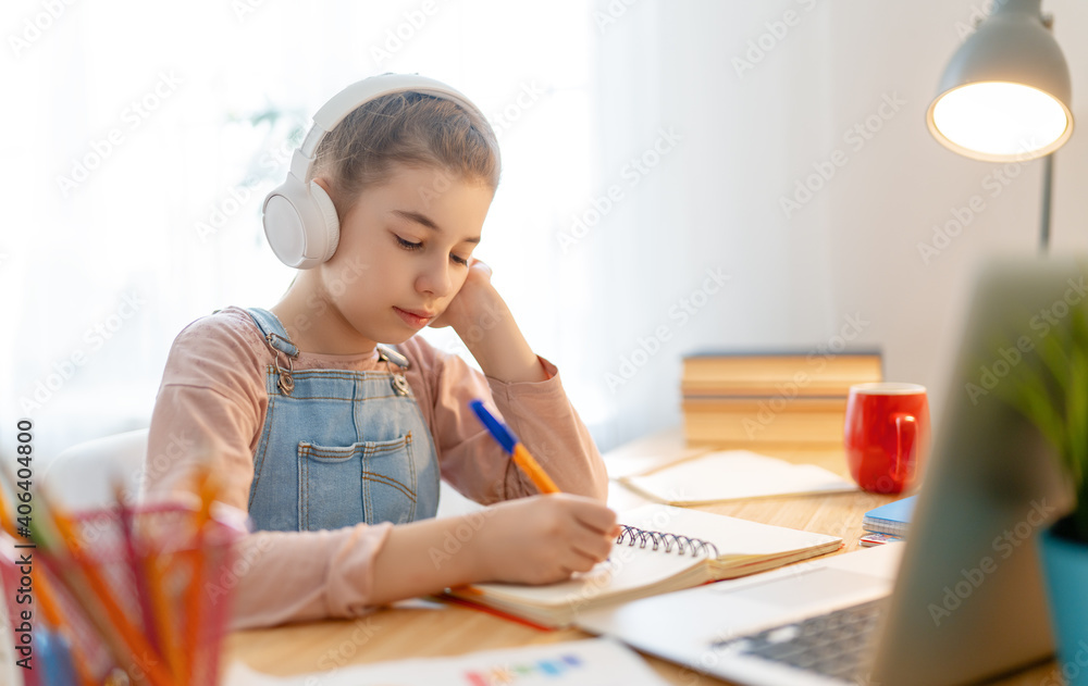 Girl doing homework or online education.