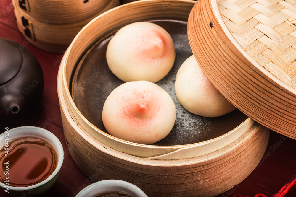 A peach-shaped birthday bun known as the Longevity Peach.Chinese specialty pastry，