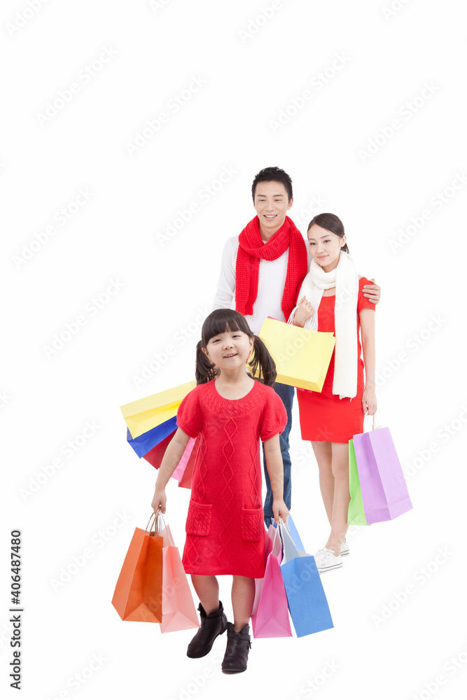 Portrait of a daughter holding shopping bags 