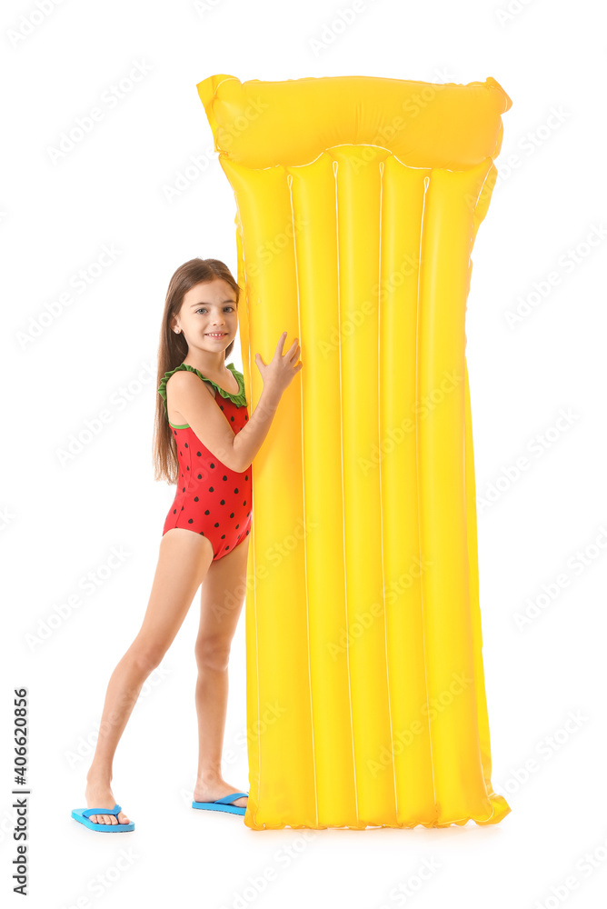 Cute little girl with inflatable mattress on white background