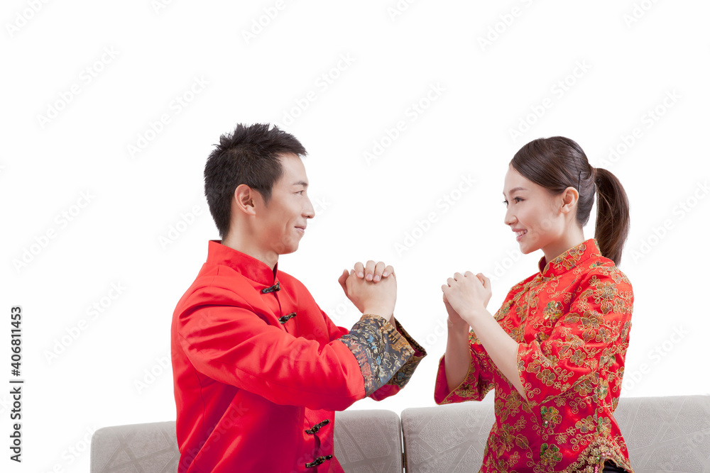 Portrait of young couple in Tang suits 