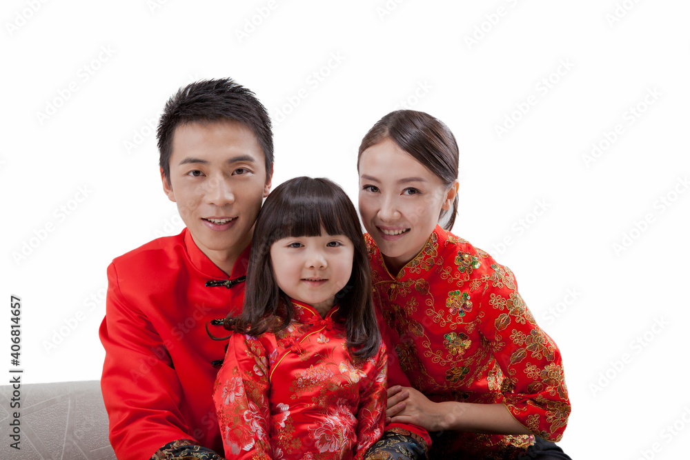 Portrait of daughter with parents in Tang suits 