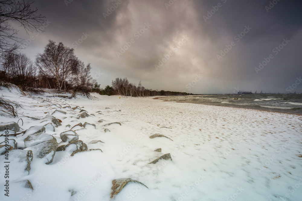 Winter landscape of a snow covered beach at Baltic Sea in Gdansk. Poland