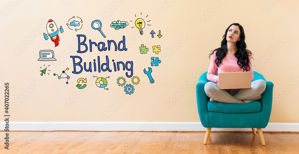 Brand building with young woman using a laptop computer