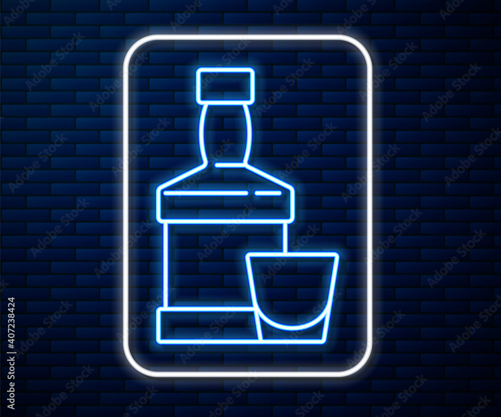 Glowing neon line Whiskey bottle and glass icon isolated on brick wall background. Vector.