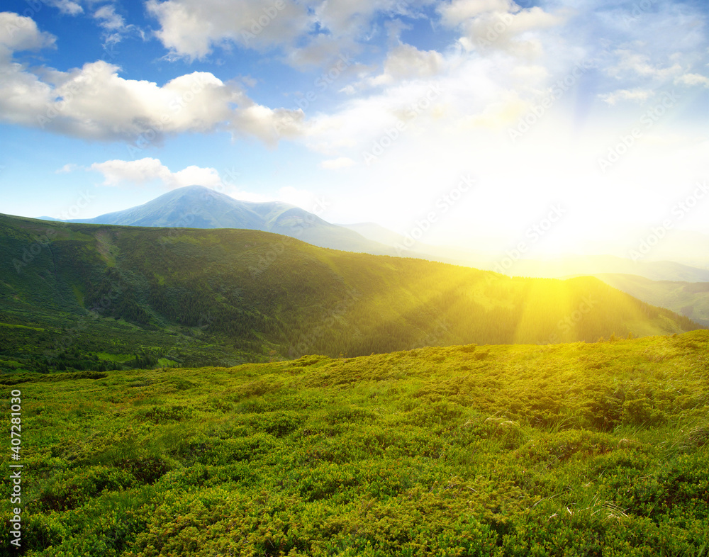 Mountain landscape on sun