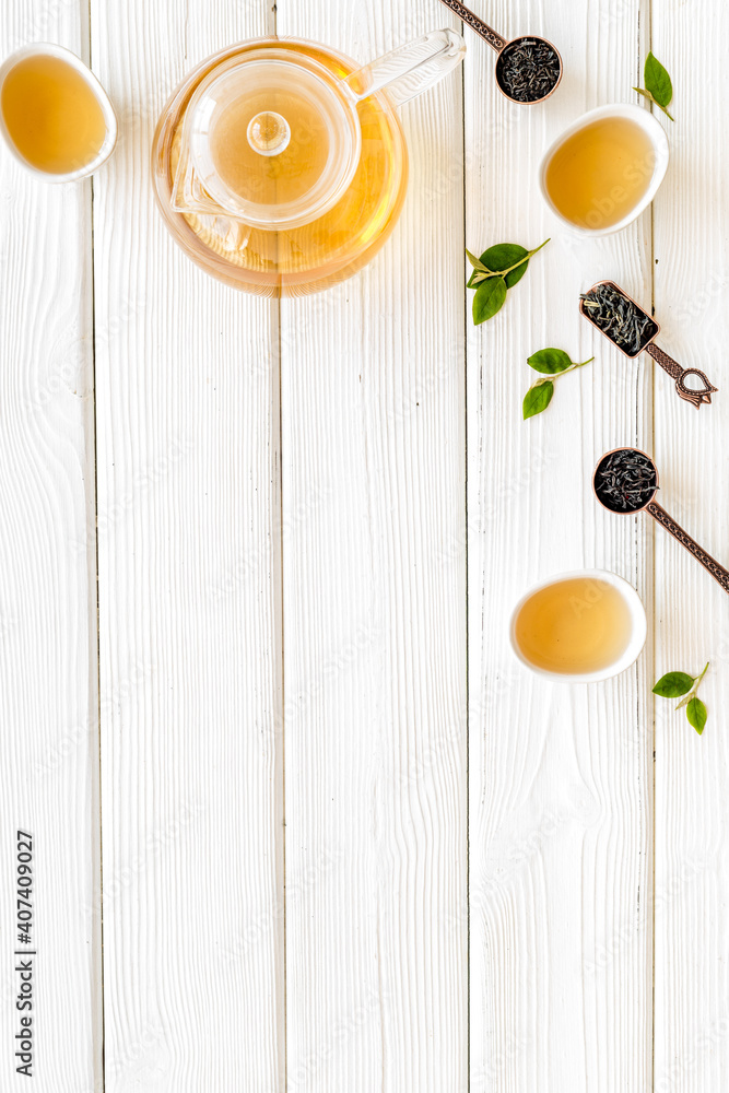 Asian tea ceremony with cups and teapot, top view