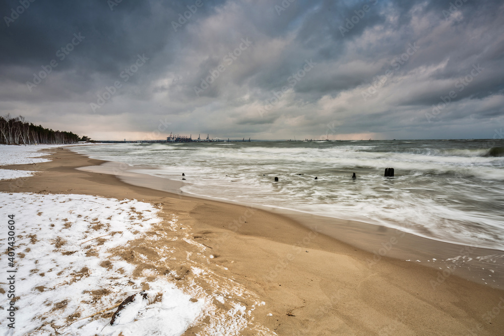 Winter landscape of a snow covered beach at Baltic Sea in Gdansk. Poland