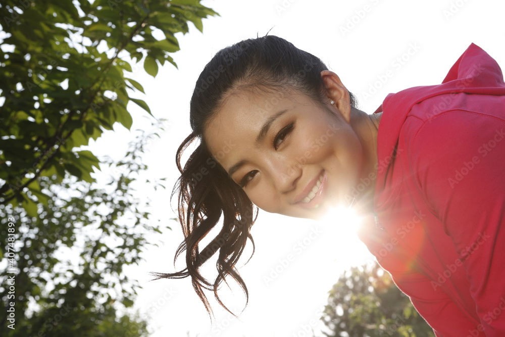 Portrait of young woman in outdoors