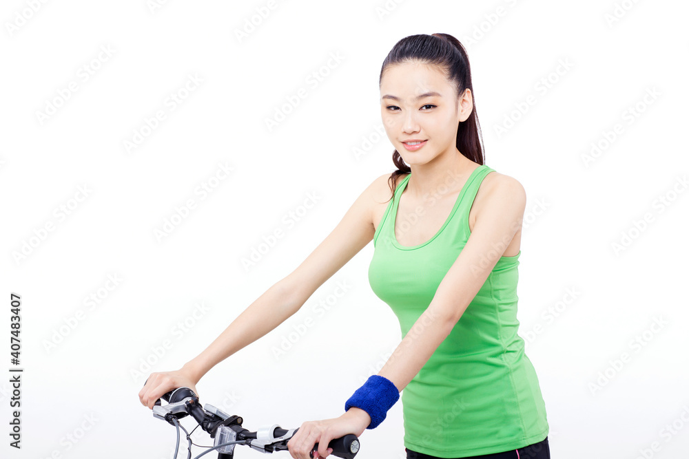 Young woman riding a bicycle