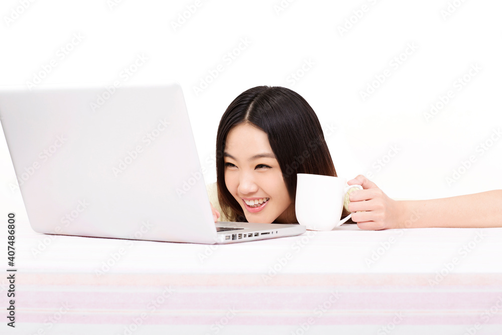 Young woman using computer