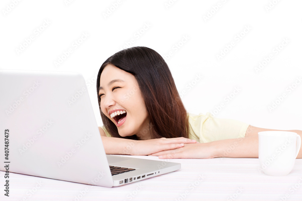 Young woman using computer