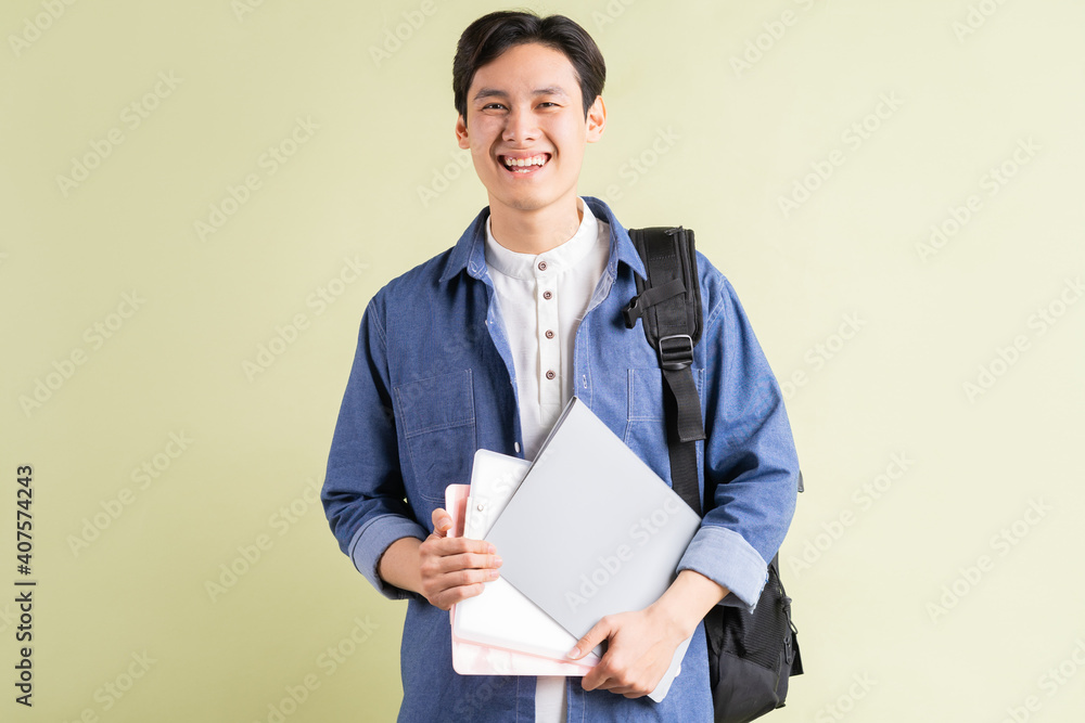 A photo of a handsome Asian student with a confident look