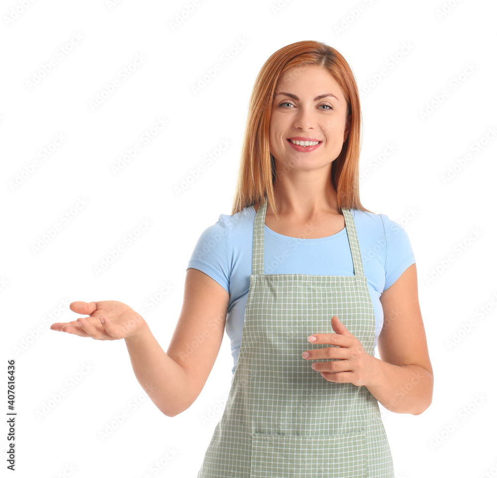 Beautiful young woman showing something on white background