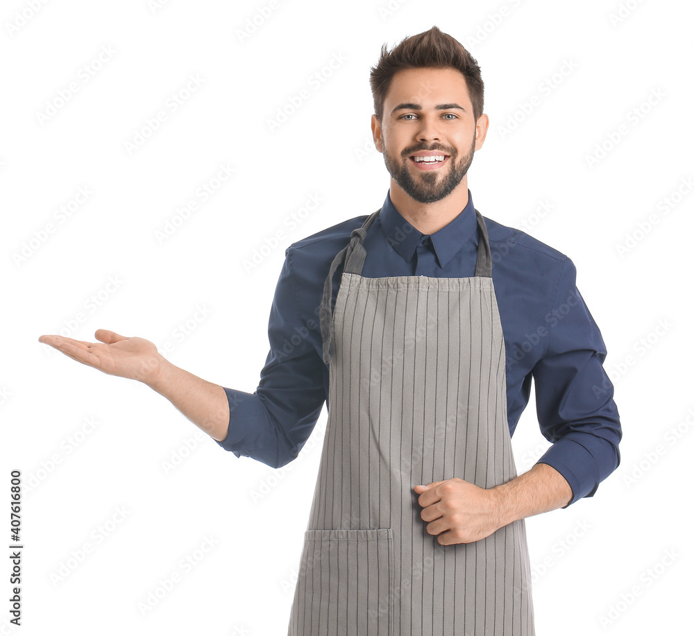 Young man showing something on white background