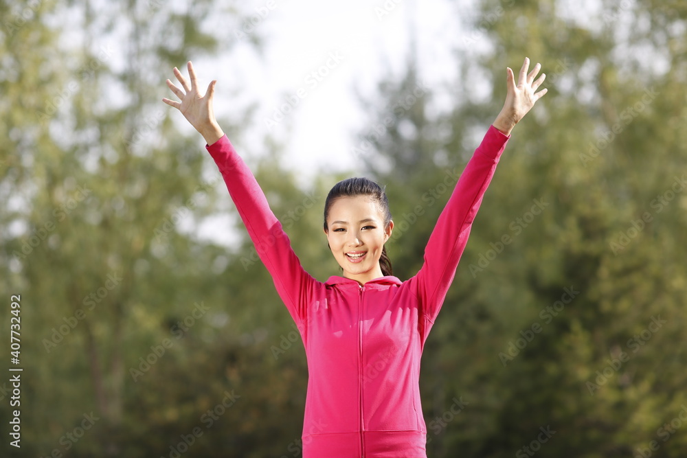 Young woman doing exercise in the outdoors